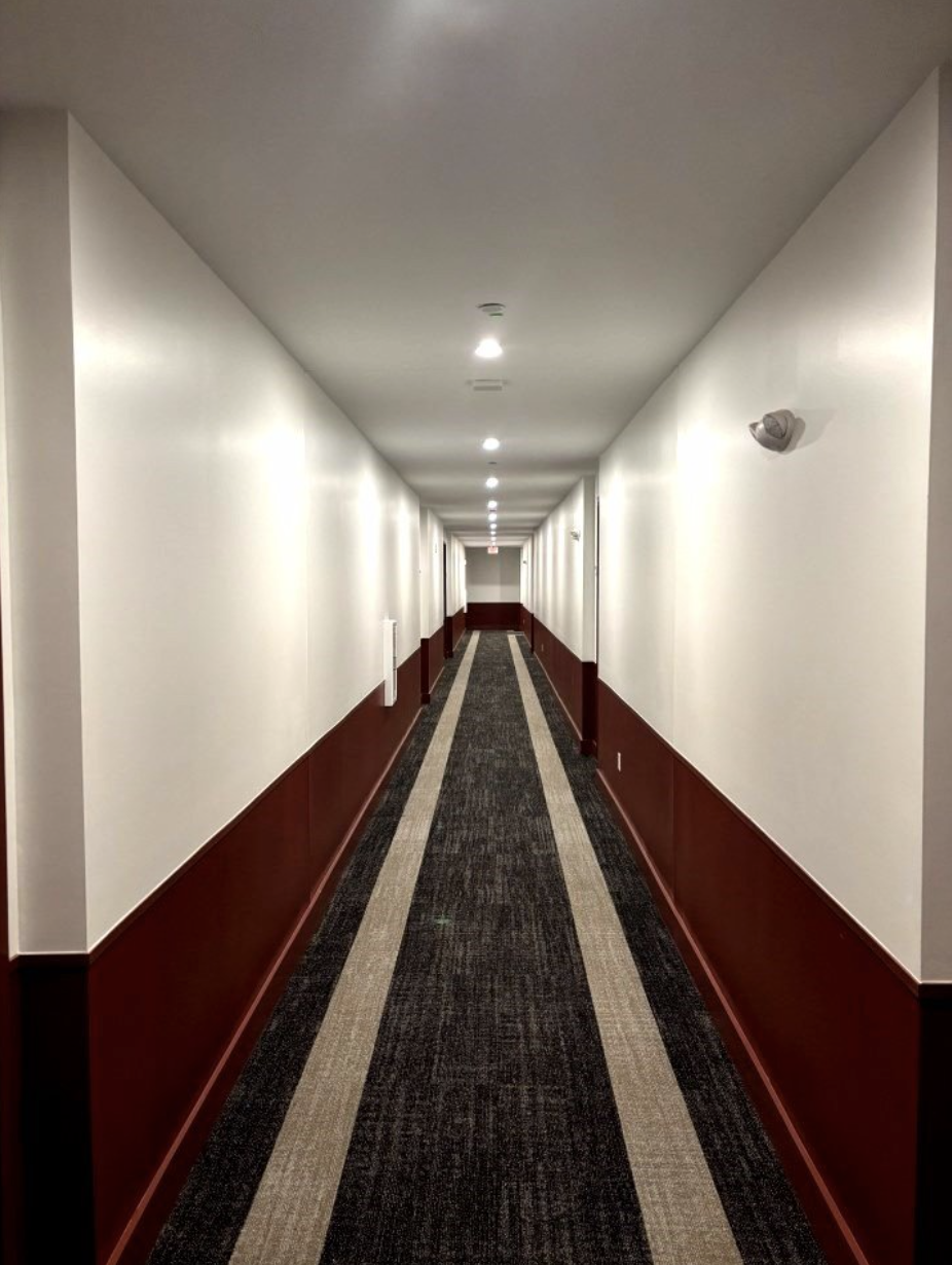 Carpet installed in the hallways of Rambler Columbus. 